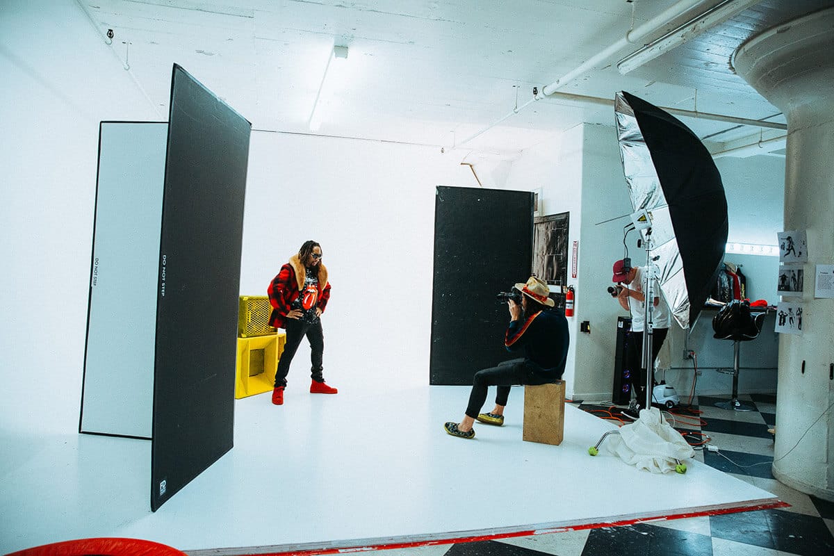 Nick Onken photographing a personal brand client in an editorial setting.