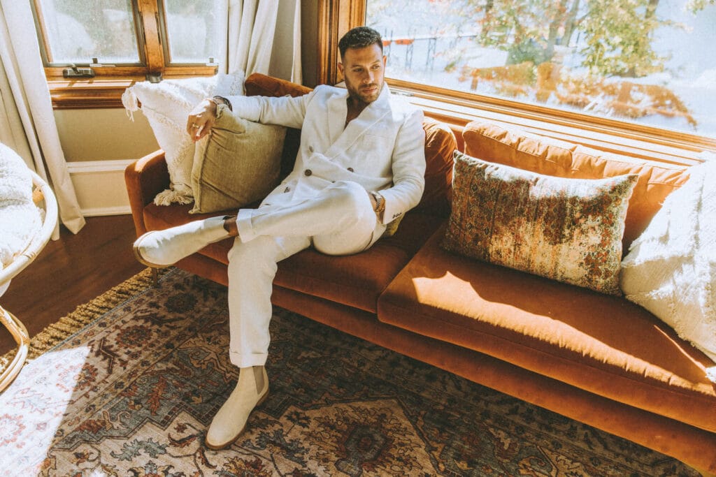 Entrepreneur photographed in a bold editorial setting showing strong leadership energy