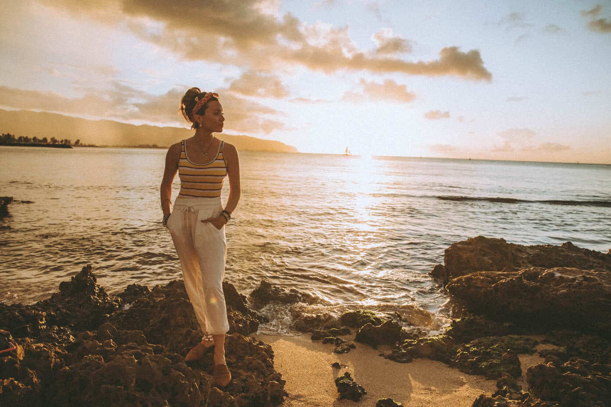 Personal brand client standing in golden light, styled editorially, radiating presence and authenticity on camera