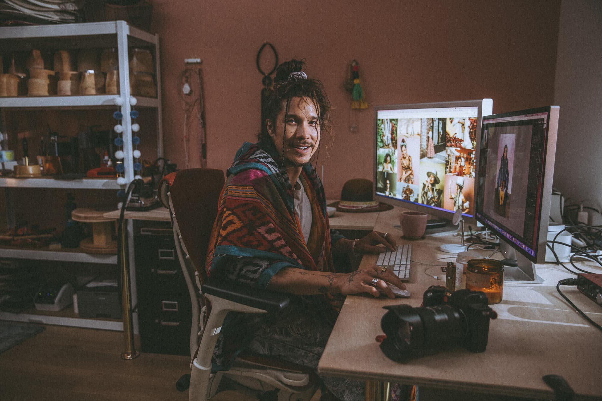 Photographer Nick Onken reviewing brand photos on dual monitors in his creative studio, highlighting the professional editing and high-value experience of a personal brand photoshoot