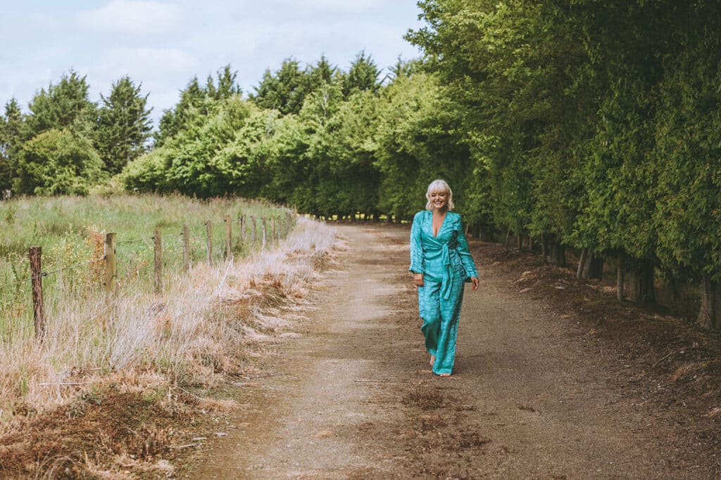 Caoimhe Harrison captured mid-movement, expressing energetic freedom in nature-based brand shoot