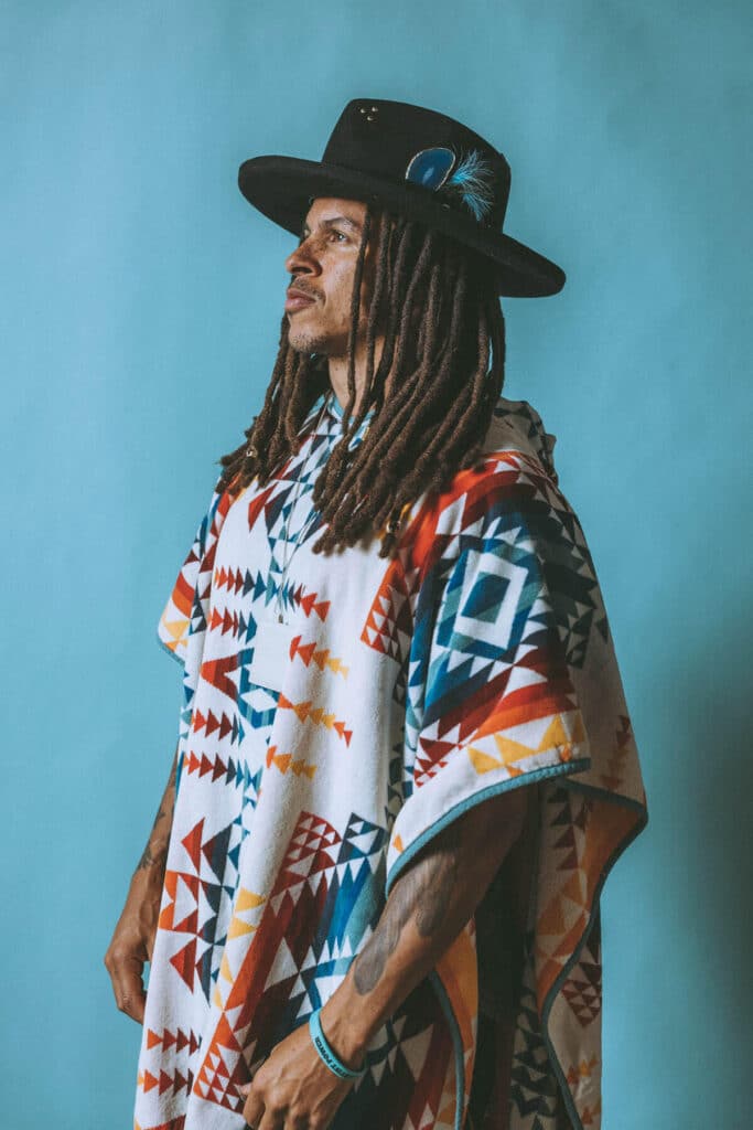 Editorial portrait capturing embodied coherence through relaxed posture and natural expression