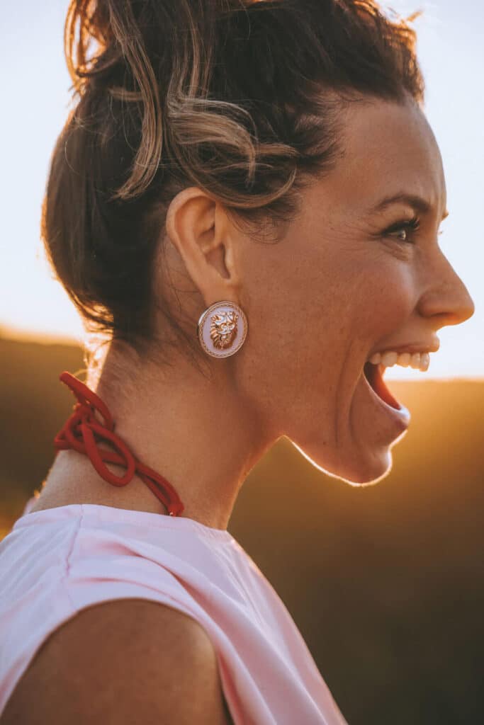 Elevated Realism portrait of Evangeline Lilly revealing her natural presence after years of editorial molding, contrasting imposed personas with quiet, authentic selfhood