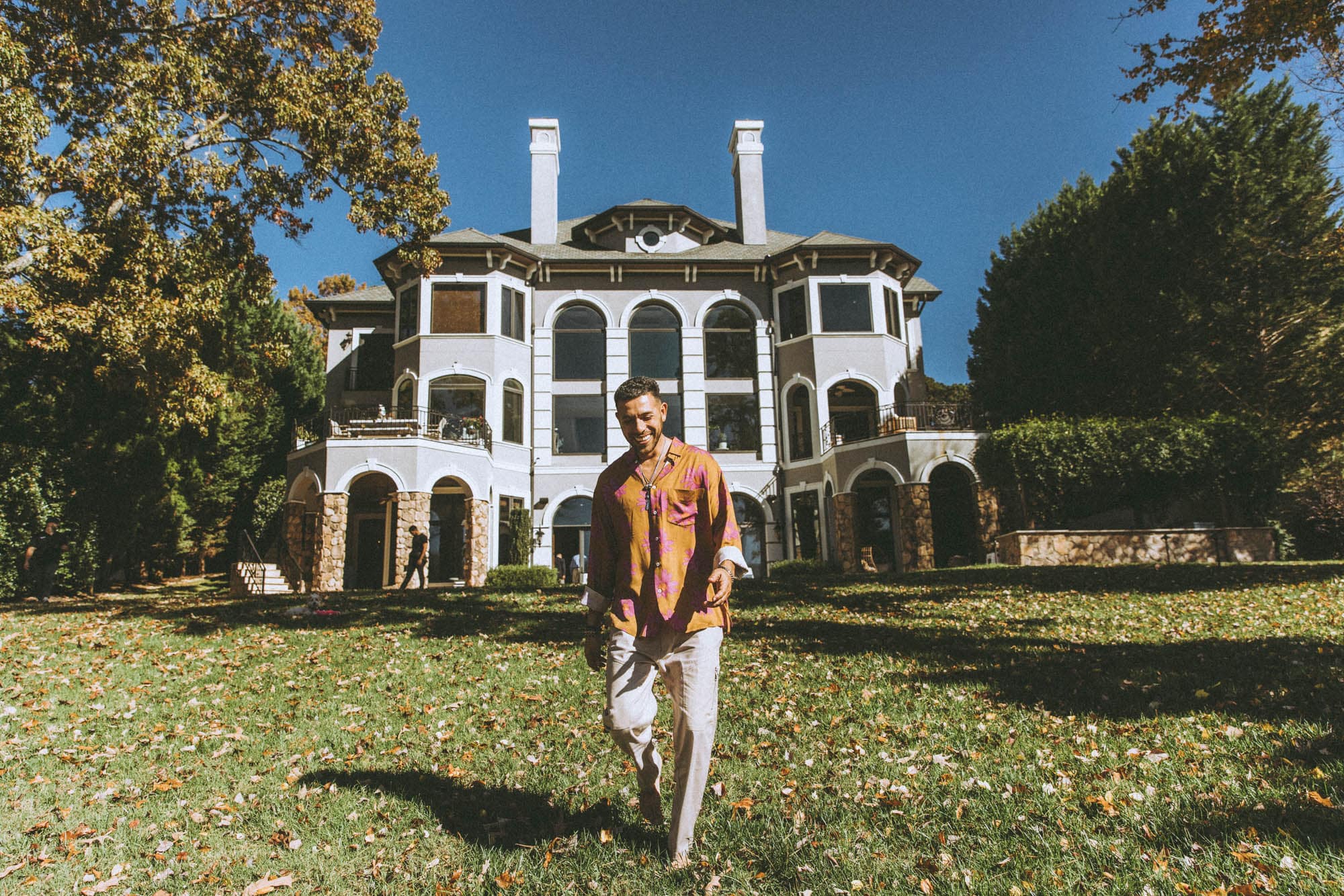 Nick Onken photographing a personal brand client in natural light with a professional camera