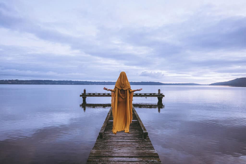 Person in solitary reflection showing private self contemplation and authentic identity