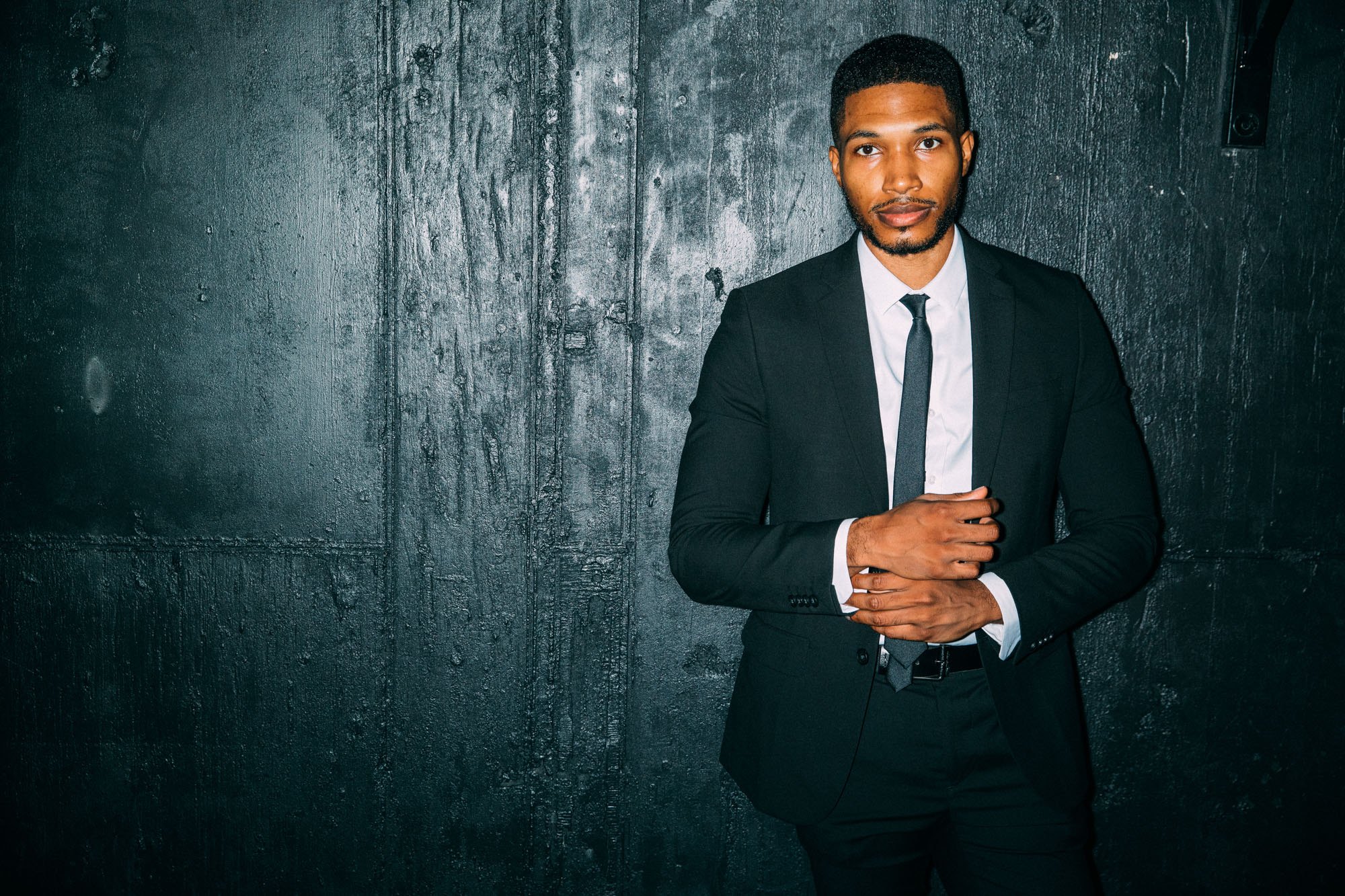 Elevated Realism portrait of a polished personal brand, the kind of presence a full brand team is hired to build.