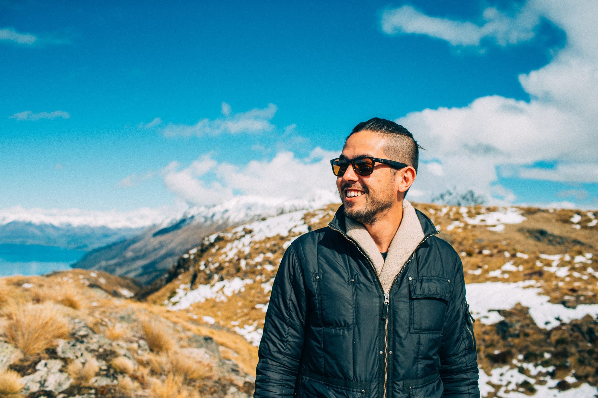 Mountain terrain stretching in every direction, breadth before depth in choosing a practice